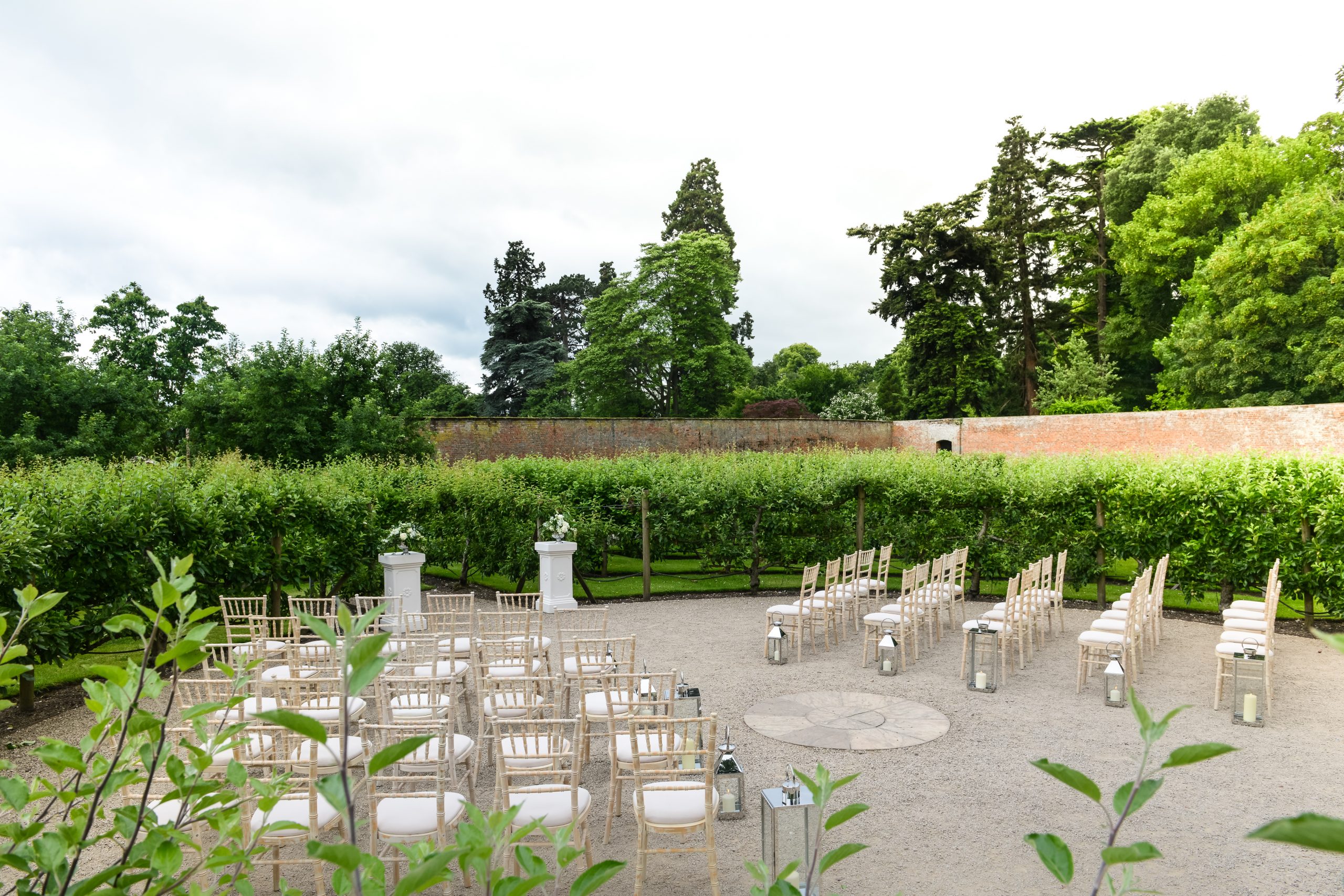 Outdoor weddings at Combermere Abbey in the fruit tree maze
