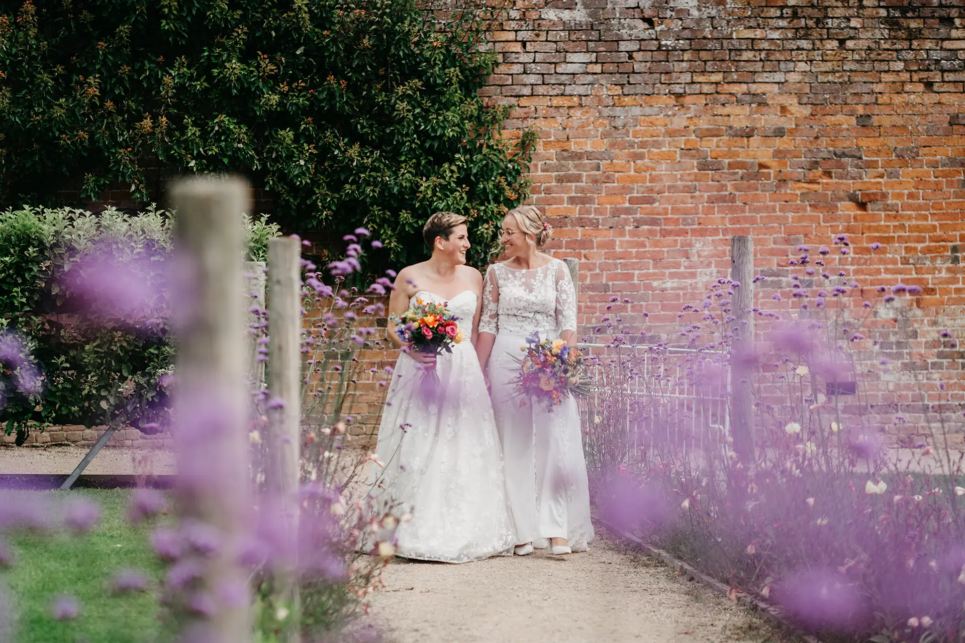 Combermere Abbey brides in garden summer