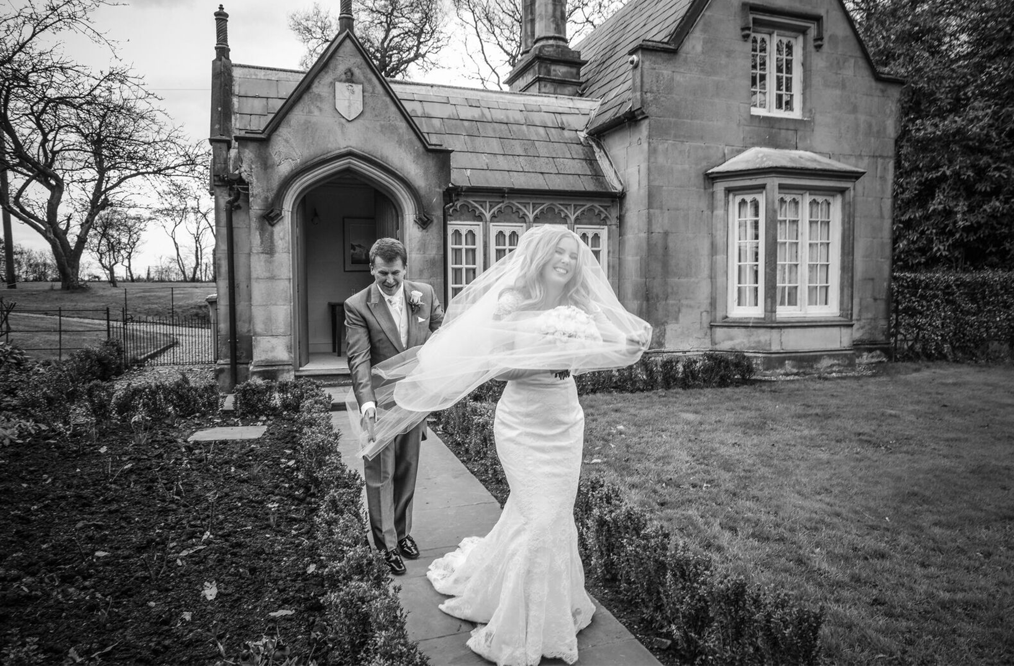 Black and white photo of bride at Combermere Abbey – Cheshire wedding venues
