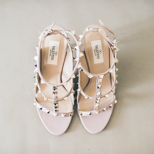 The bride wore beautiful Valentino wedding shoes embellished with small silver studs
