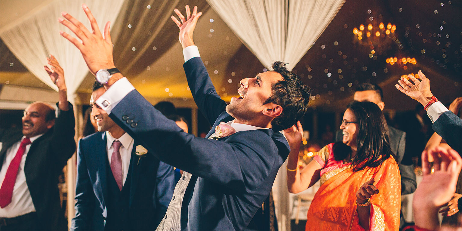 Guests enjoy dancing as the evening wedding reception gets underway – party wedding venues