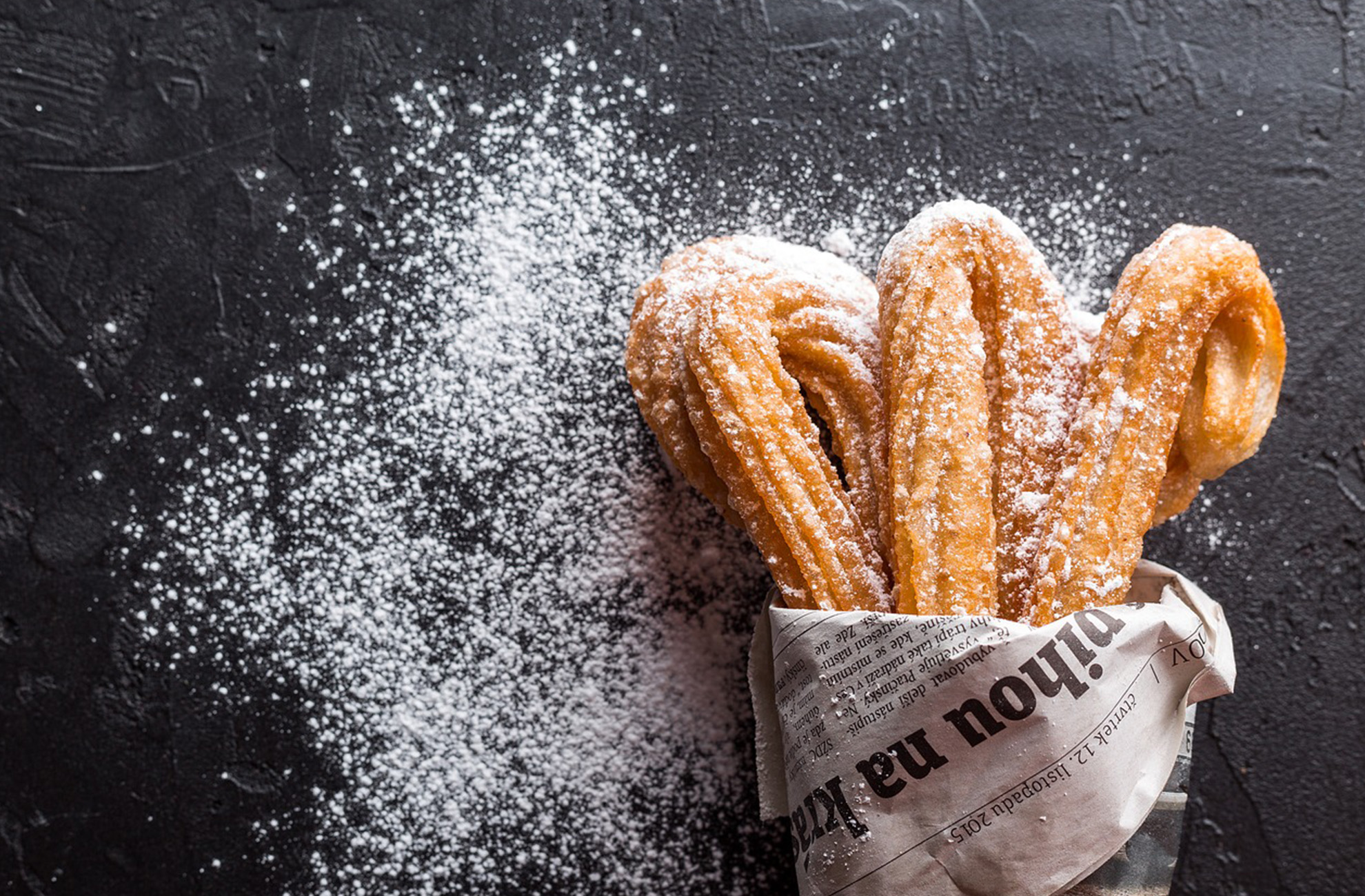 Indulge in some tasty churros at the Whitchurch Food Festival sponsored by Combermere Abbey