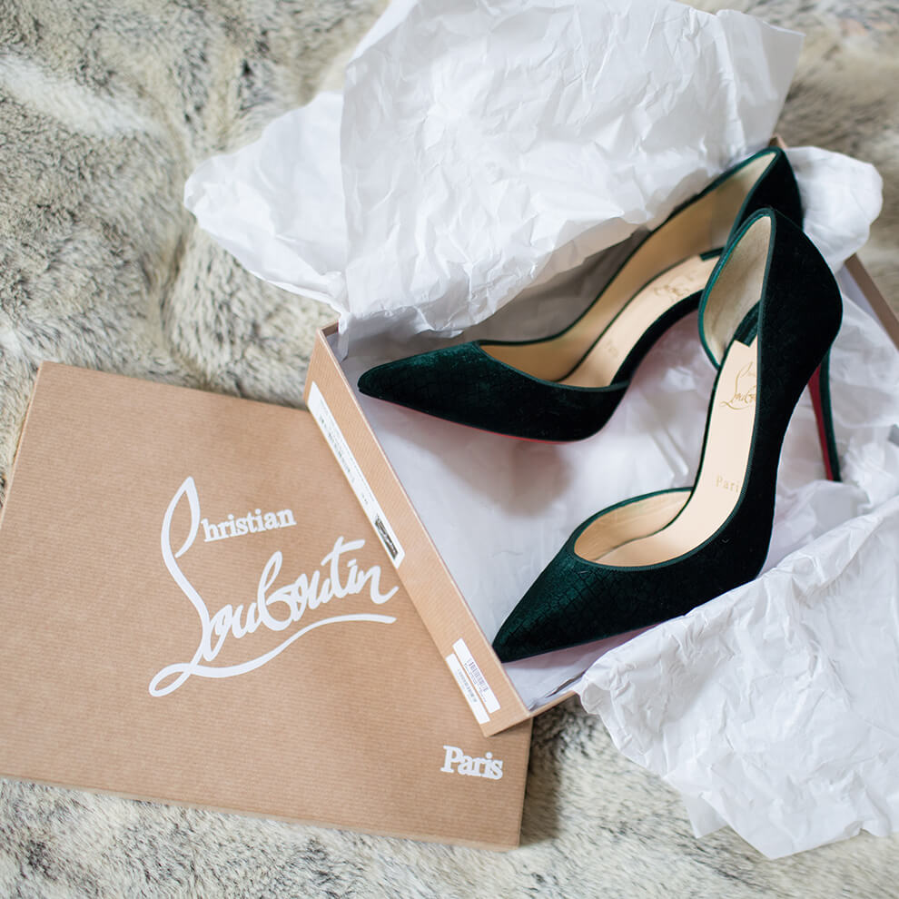 The bride wore green Louboutin wedding shoes for her wedding day at Combermere Abbey in Cheshire