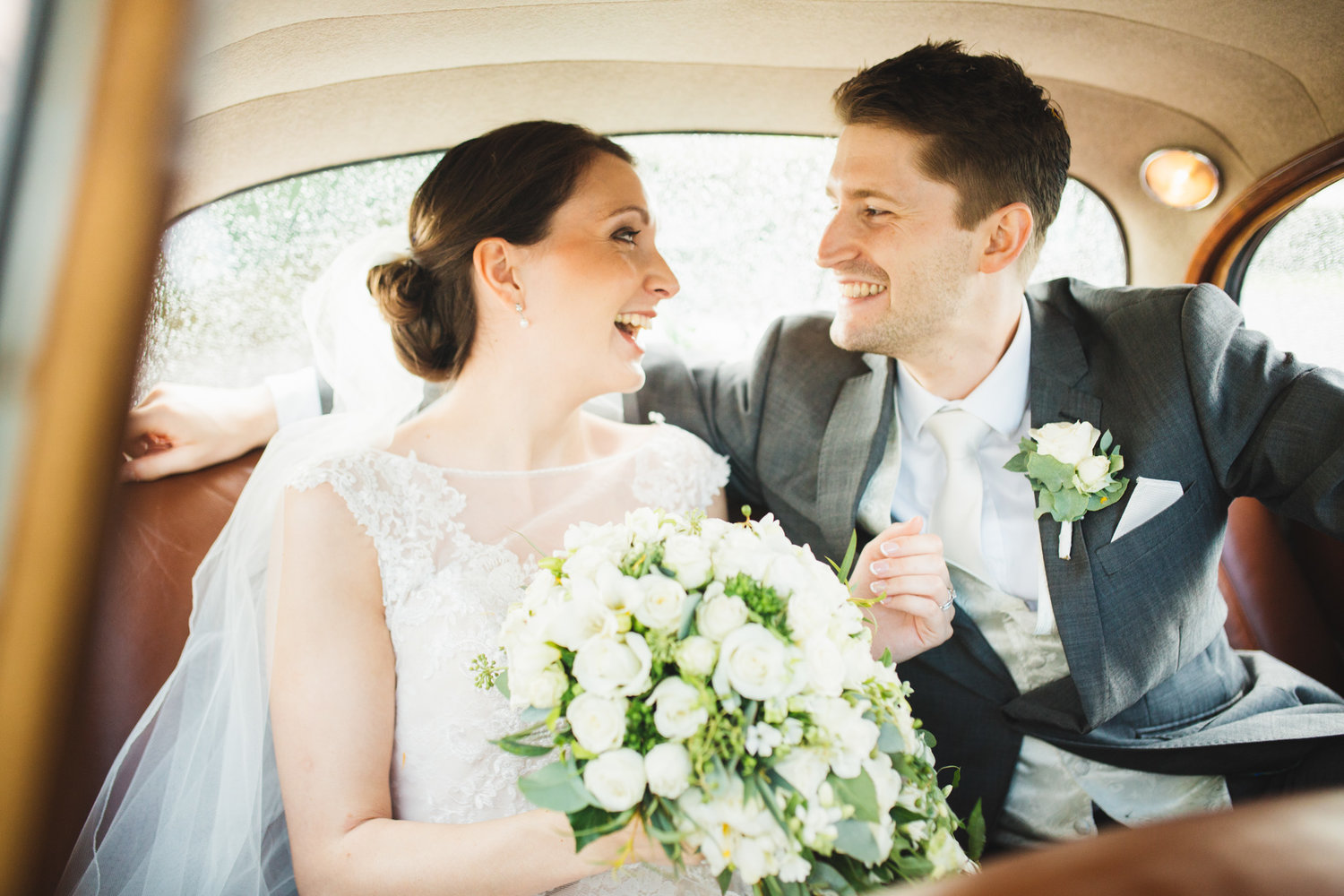 Wedding couple in the Crossley Car